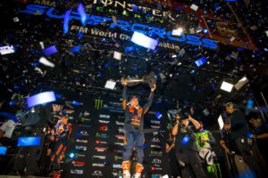 Cooper webb raised the monster energy ama supercross championship trophy for the first time in 2019. Photo by feld entertainment, inc.