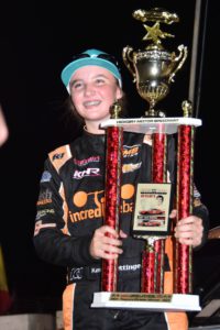 Katie hettinger becomes the youngest winner at hickory motor speedway.
