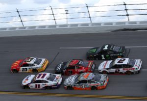 Credit: talladega, alabama - october 04: bubba wallace, driver of the #23 mcdonald's toyota, and denny hamlin, driver of the #11 fedex express toyota, lead a pack of cars during the nascar cup series yellawood 500 at talladega superspeedway on october 04, 2021 in talladega, alabama. (photo by sean gardner/getty images)