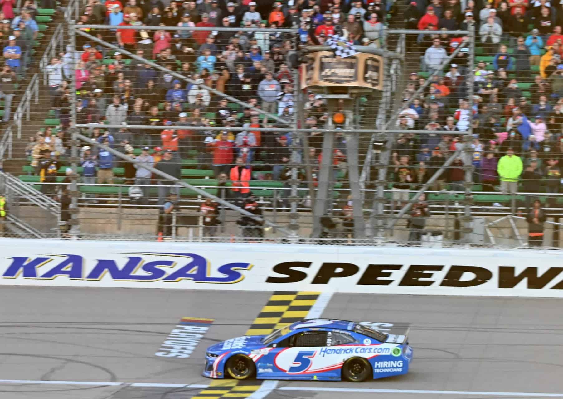Kyle Larson gets his third straight NASCAR win, snags the checkered flag at Kansas Speedway. Photo by Jerry Jordan/Kickin' the Tires