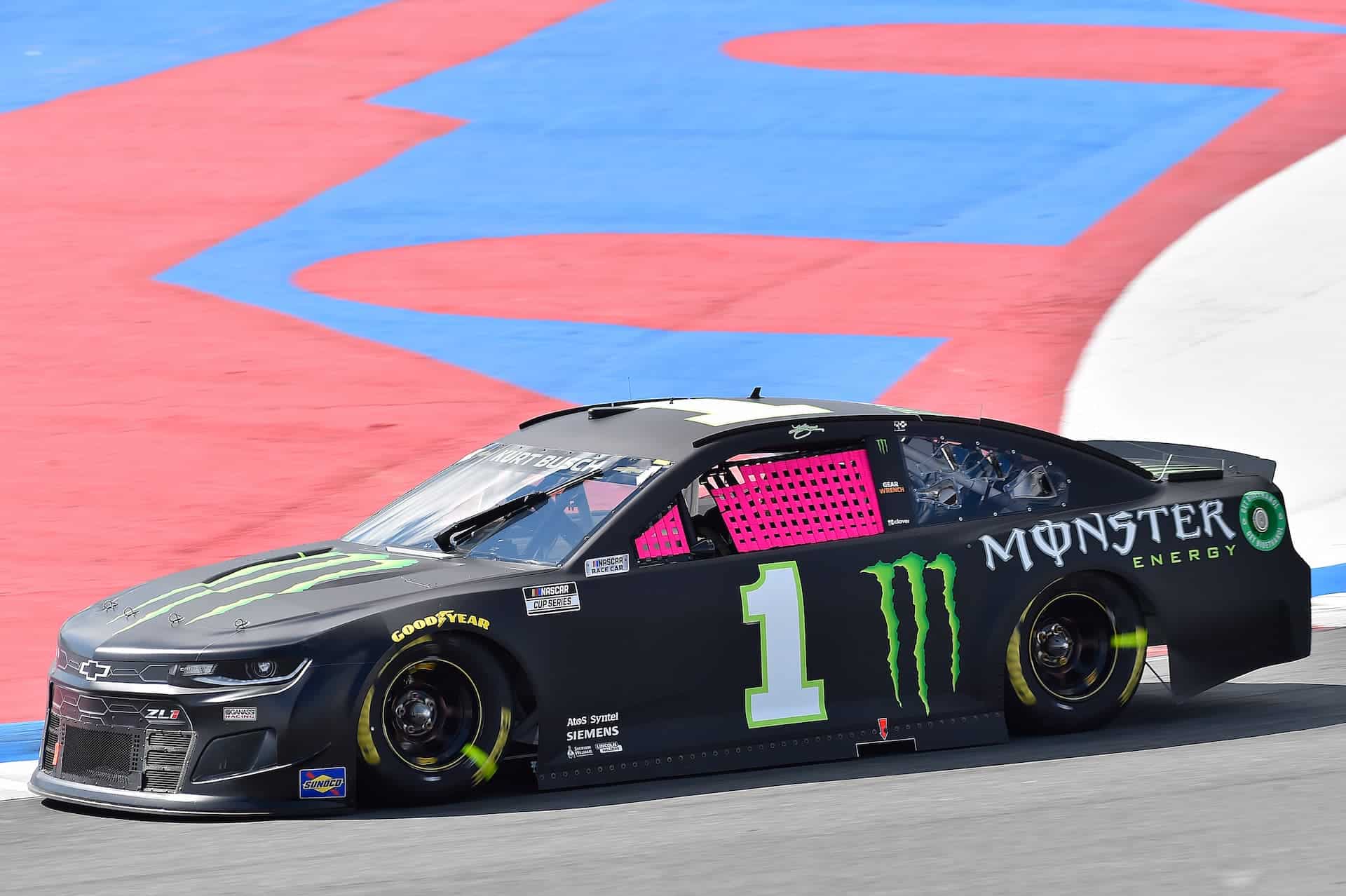 Kurt Busch introduces pink window net for breast cancer awareness in the NASCAR Cup Series race at the 2021 ROVAL at Charlotte Motor Speedway. Photo by Nigel Kinrade Photography.