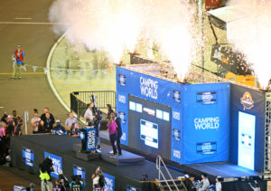 Ben rhodes hoists the camping world truck series. Photo by jerry jordan/kickin' the tires