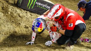 Hunter lawrence crawls to the side of the whoops while the alpinestars medical crew tend to his aid. Photo by rachel schuoler with kickin' the tires.