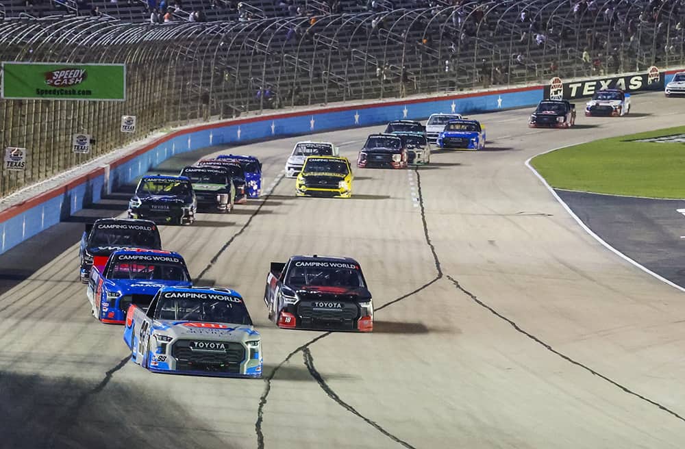 Christian Eckes led the field on the final lap at Texas Motor Speedway but was chased down by Stewart Friesen, who stole the win. Photo by Rachel Schuoler/Kickin' the Tires