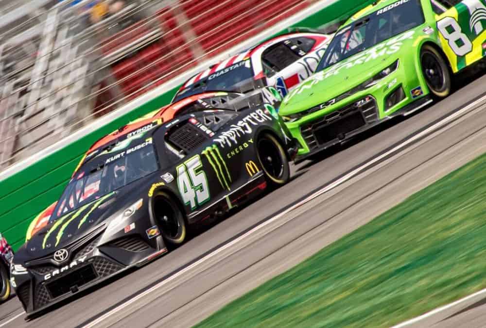Kurt busch and tyler reddick race each other at atlanta motor speedway. Photo by christian koelle/kickin' the tires