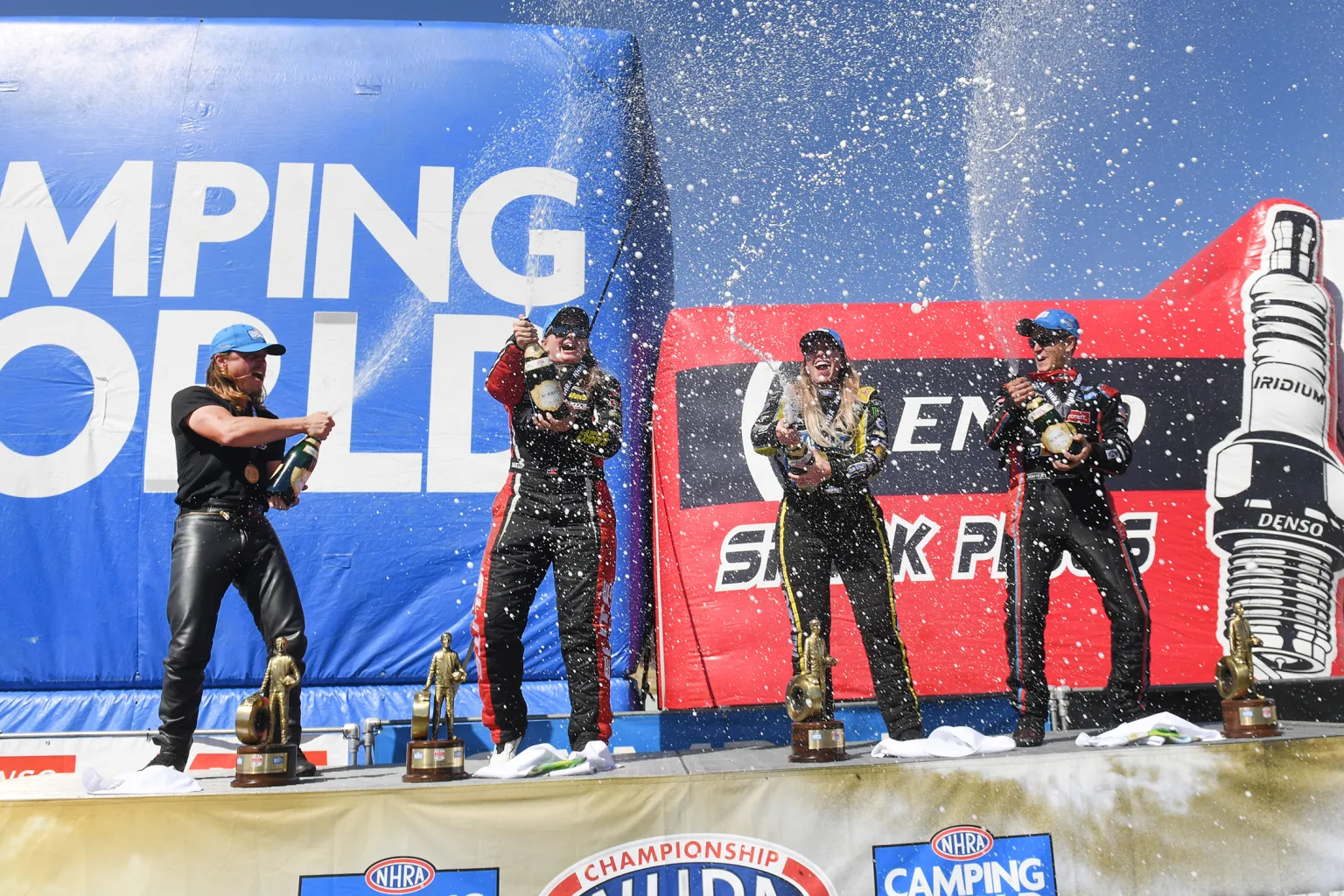 Drag racers pop the bubble after claiming their Wally's at the NHRA Sonoma Nationals. Courtesy photo