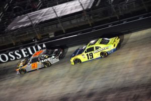 Brandon jones (19) chases noah gragson in the final laps friday night at bristol motor speedway.