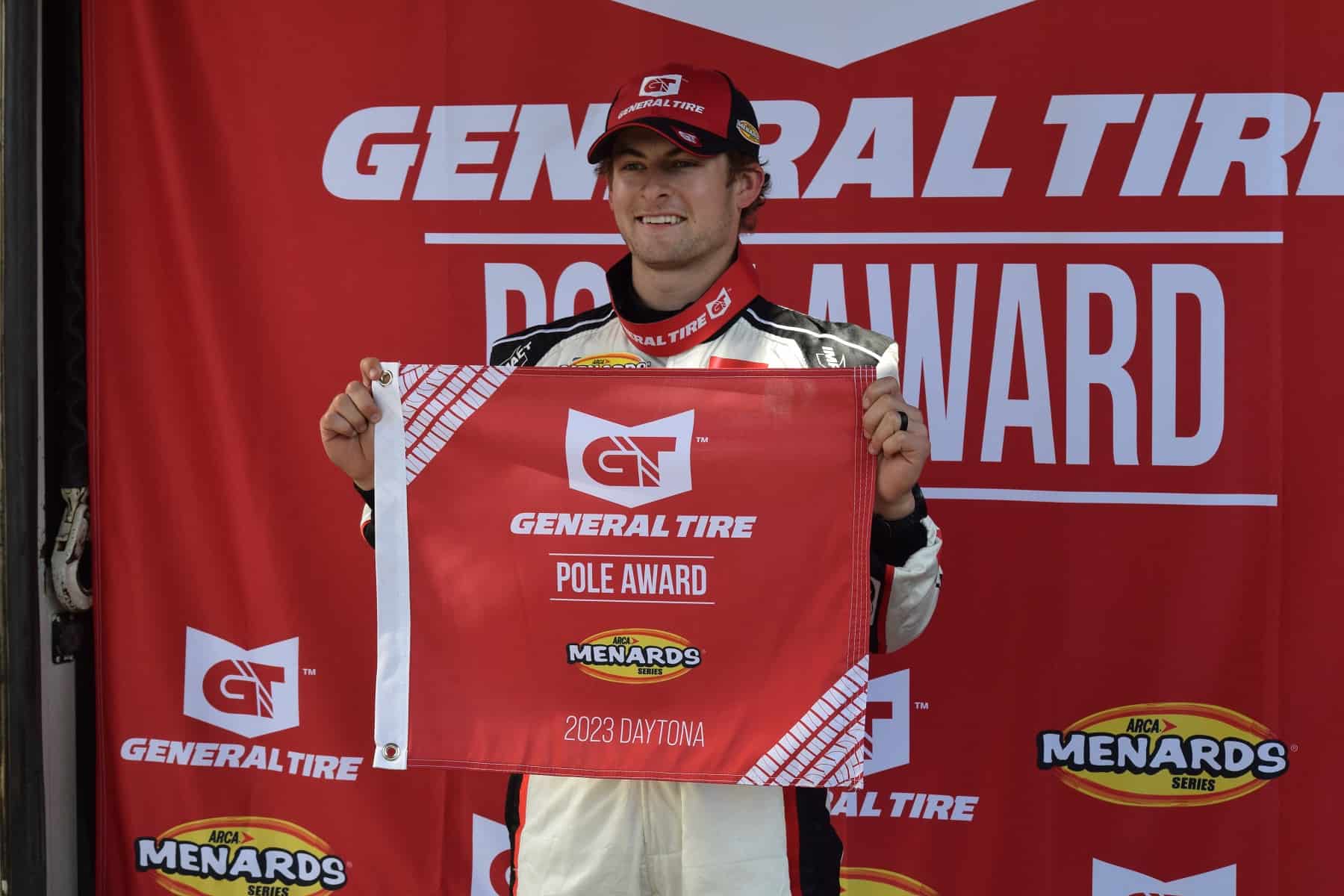 Connor Mosack poses with the General Tire Pole Award Friday at Daytona Int'l Speedway.