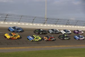 Joey logano (22) leads the field sunday at daytona int'l speedway.