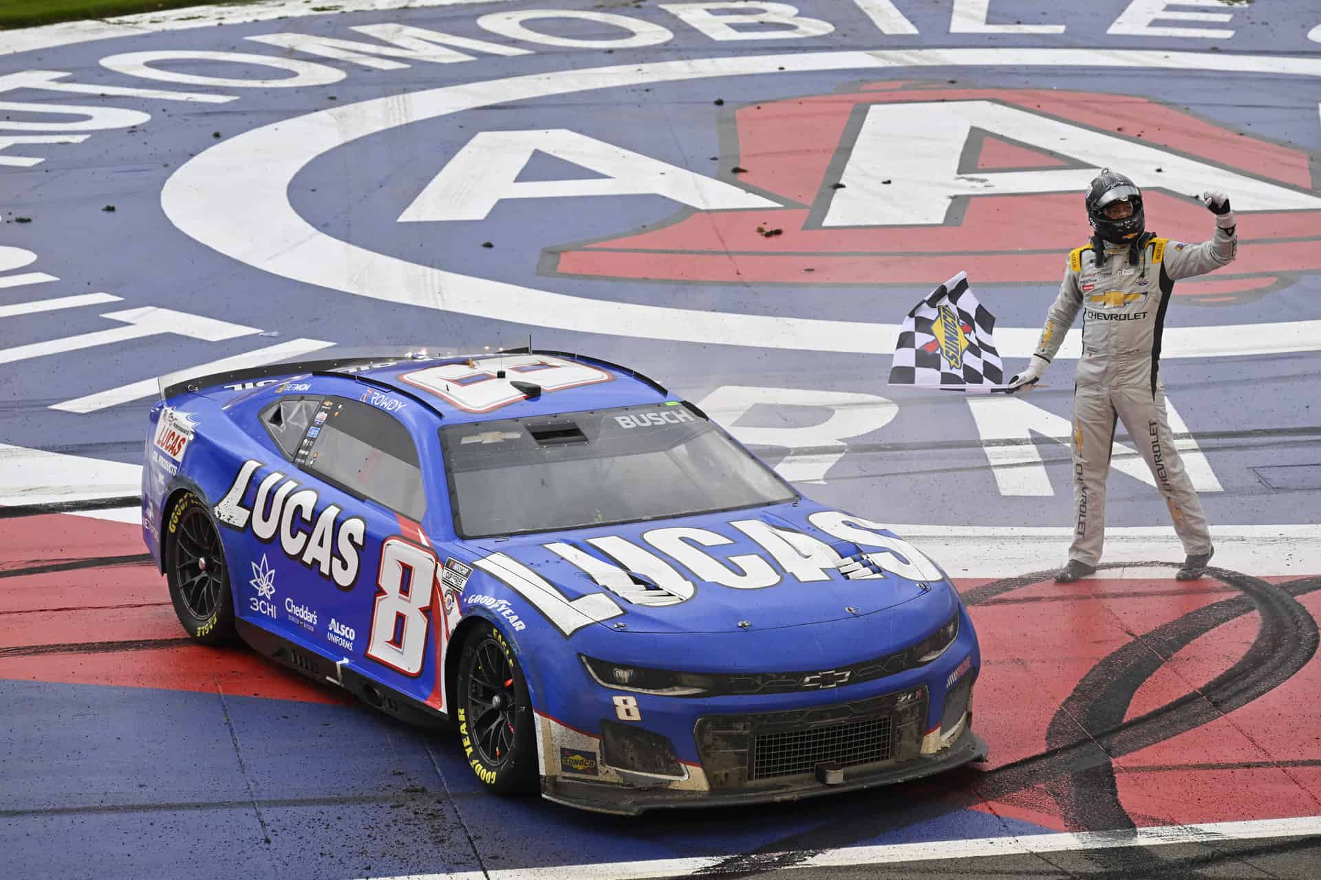 Kyle Busch celebrates victory in the final 2-mile venture at Auto Club Speedway.