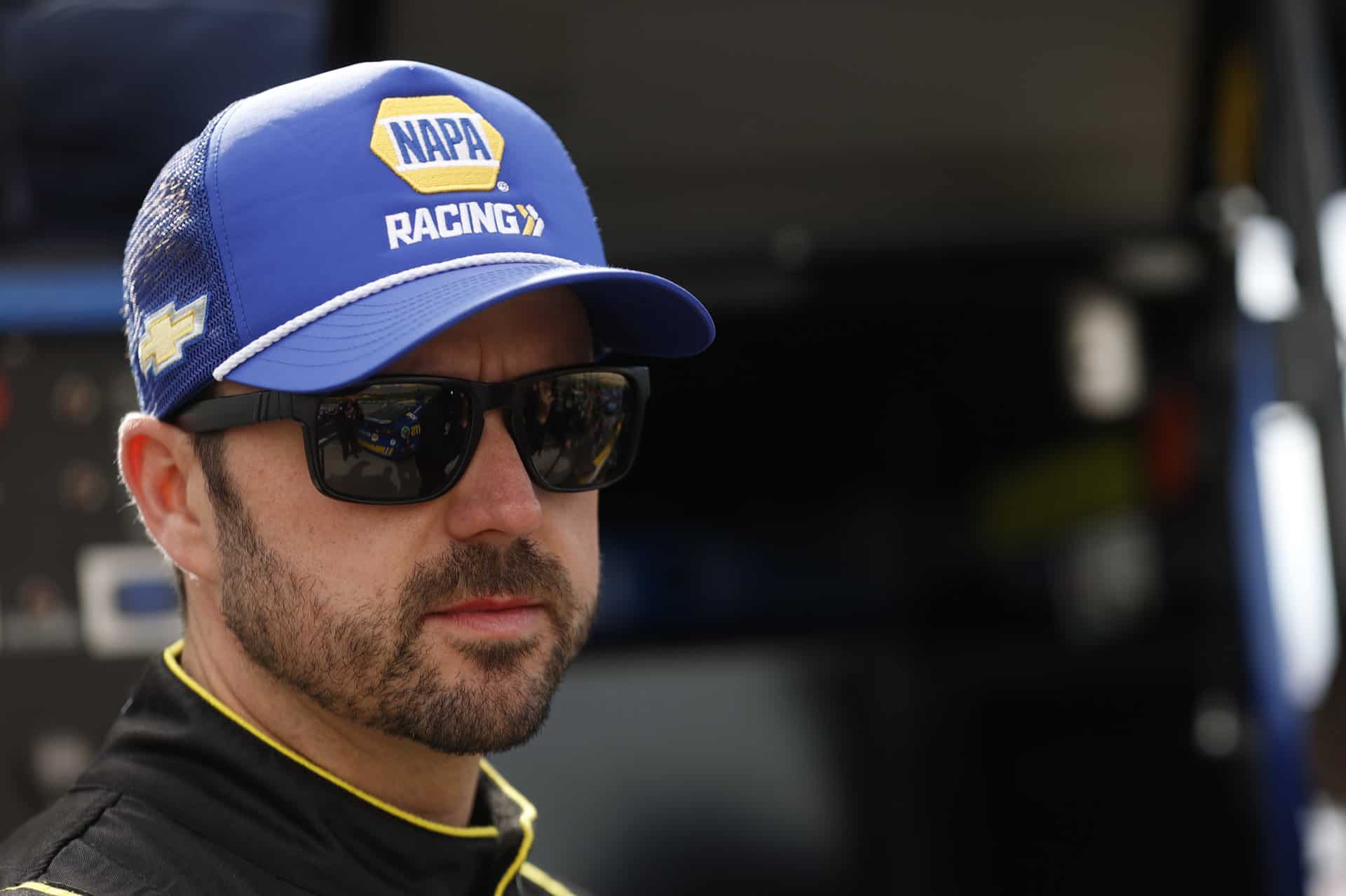 Josh Berry puts on a NAPA Racing hat as he substitutes for the injured Chase Elliott at Las Vegas Motor Speedway. Photo by Nigel Kinrade Photography.