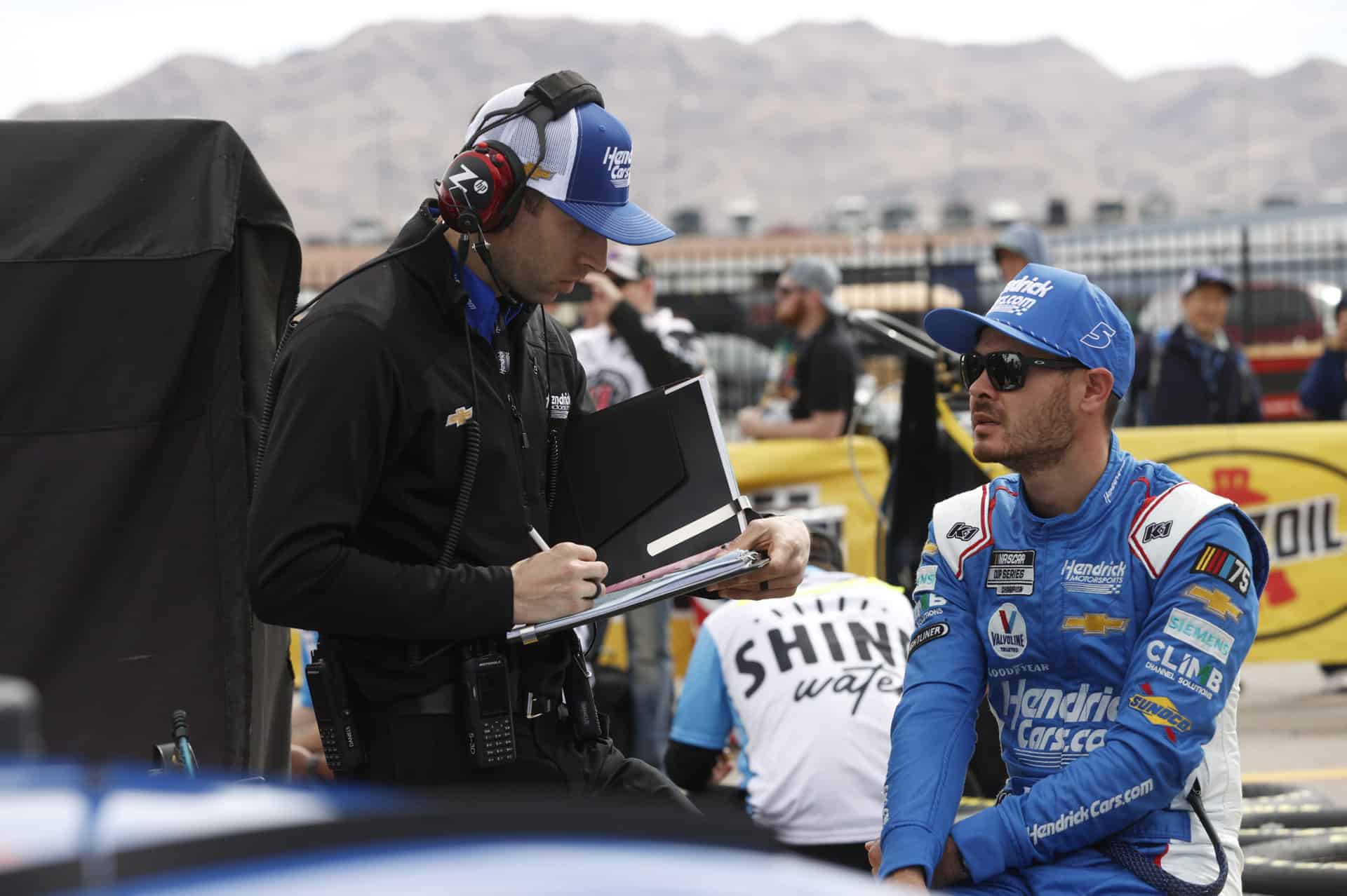 Kyle Larson and crew chief Cliff Daniels debrief together during the NASCAR Cup Series visit to Las Vegas Motor Speedway. Photo by Nigel Kinrade Photography.