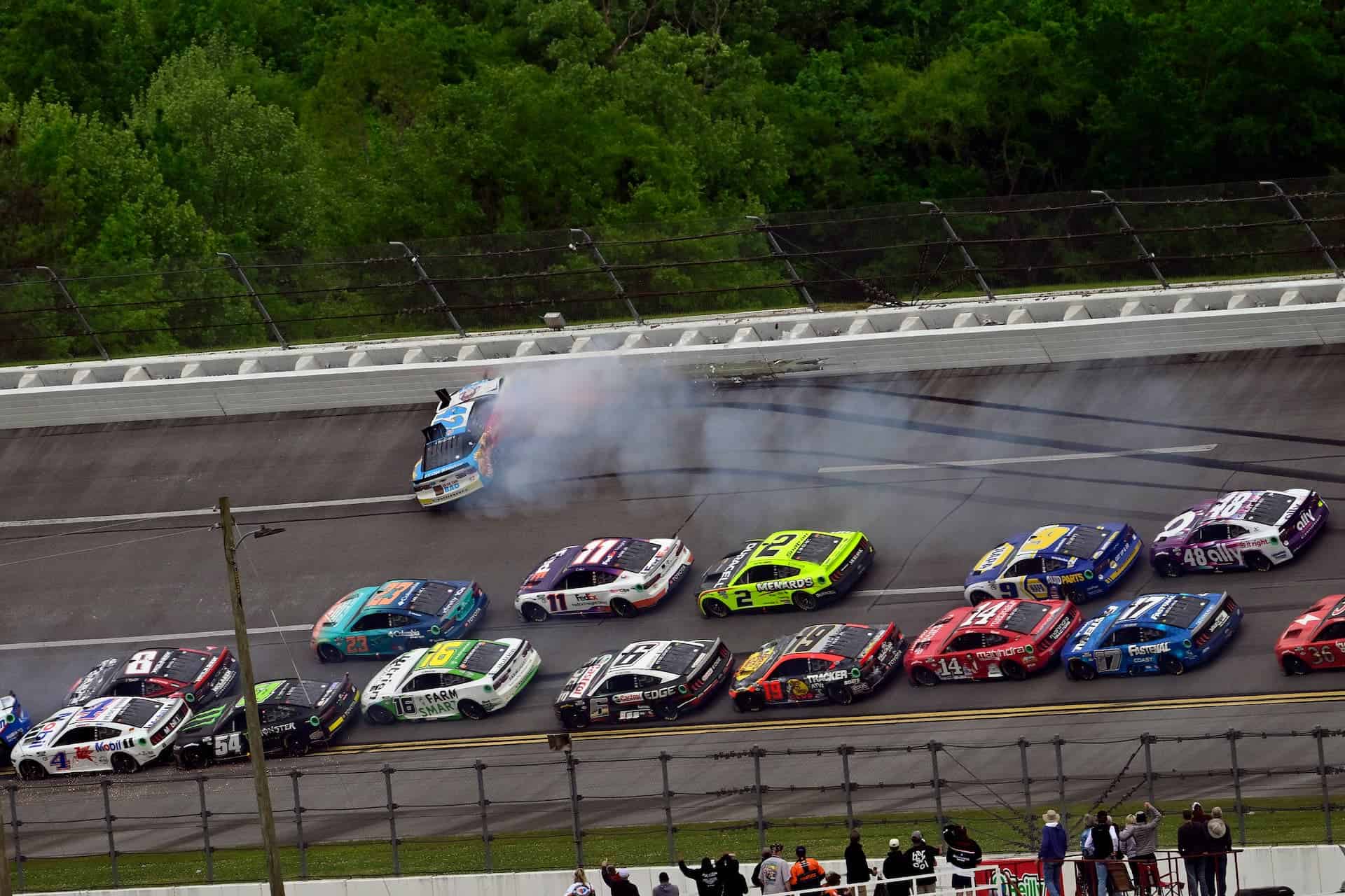 Noah Gragson crashes at Talladega Superspeedway while battling for the lead of the 2023 Geico 500. Photo by Nigel Kinrade Photography.