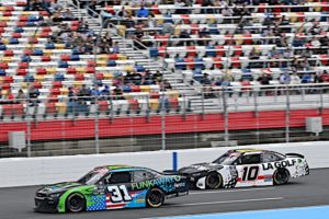 An unprecedented doubleheader at charlotte motor speedway allowed justin haley to set a new single day mileage record in nascar history.