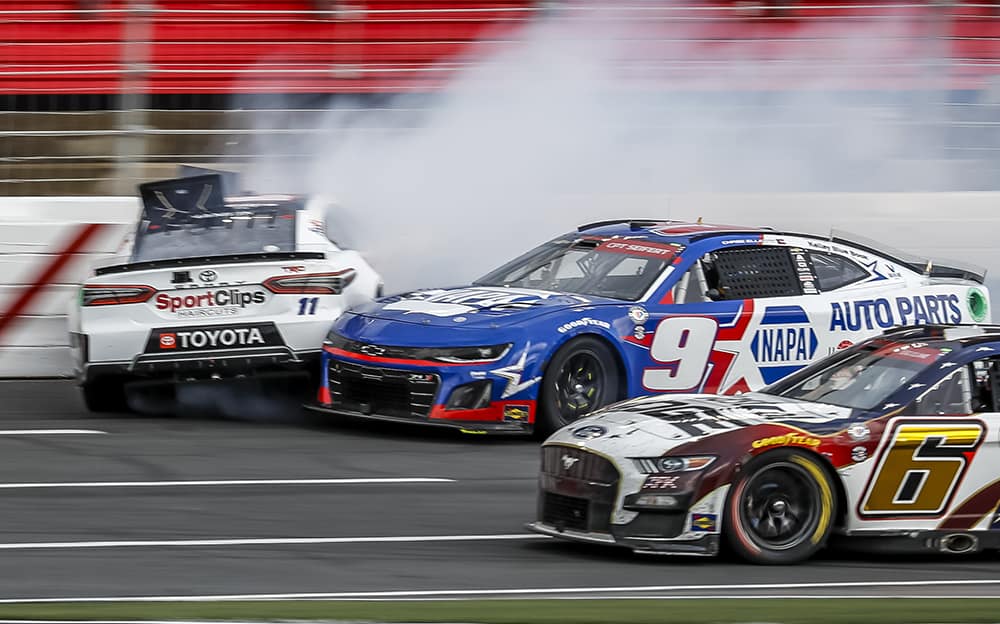 NASCAR suspends Chase Elliott for hooking Denny Hamlin in retaliation for squeezing him up the track in Turn 4 at Charlotte. Photo by Lesley Ann Miller/NKP