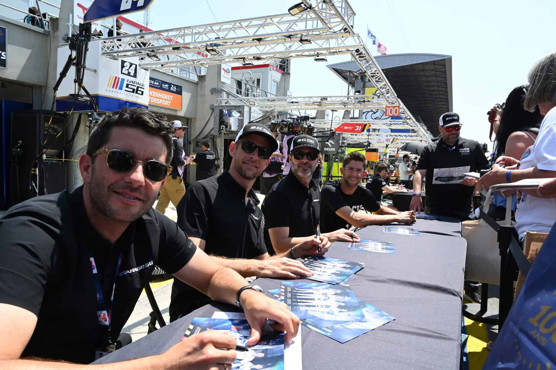 Mike Rockenfeller, Jensen Button, Jimmie Johnson and Jordan Taylor were a big hit at the 24 Hours of Le Mans autograph session. Photo by Jerry Jordan/Kickin' the Tires
