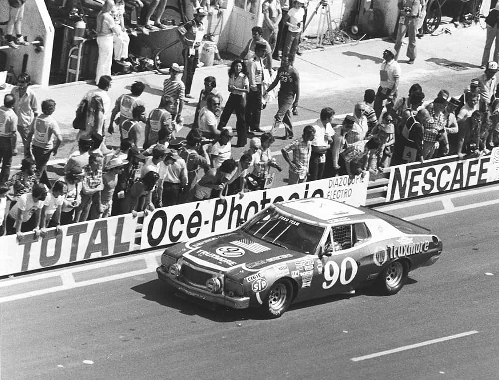 The car owned by nascar's junie donlavey roars pas the crowd in the 1976 24 hours of le mans. (photo by isc image archives via getty images)
