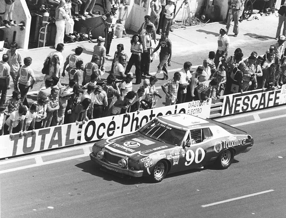 The car owned by NASCAR's Junie Donlavey roars pas the crowd in the 1976 24 Hours of Le Mans. (Photo by ISC Image Archives via Getty Images)