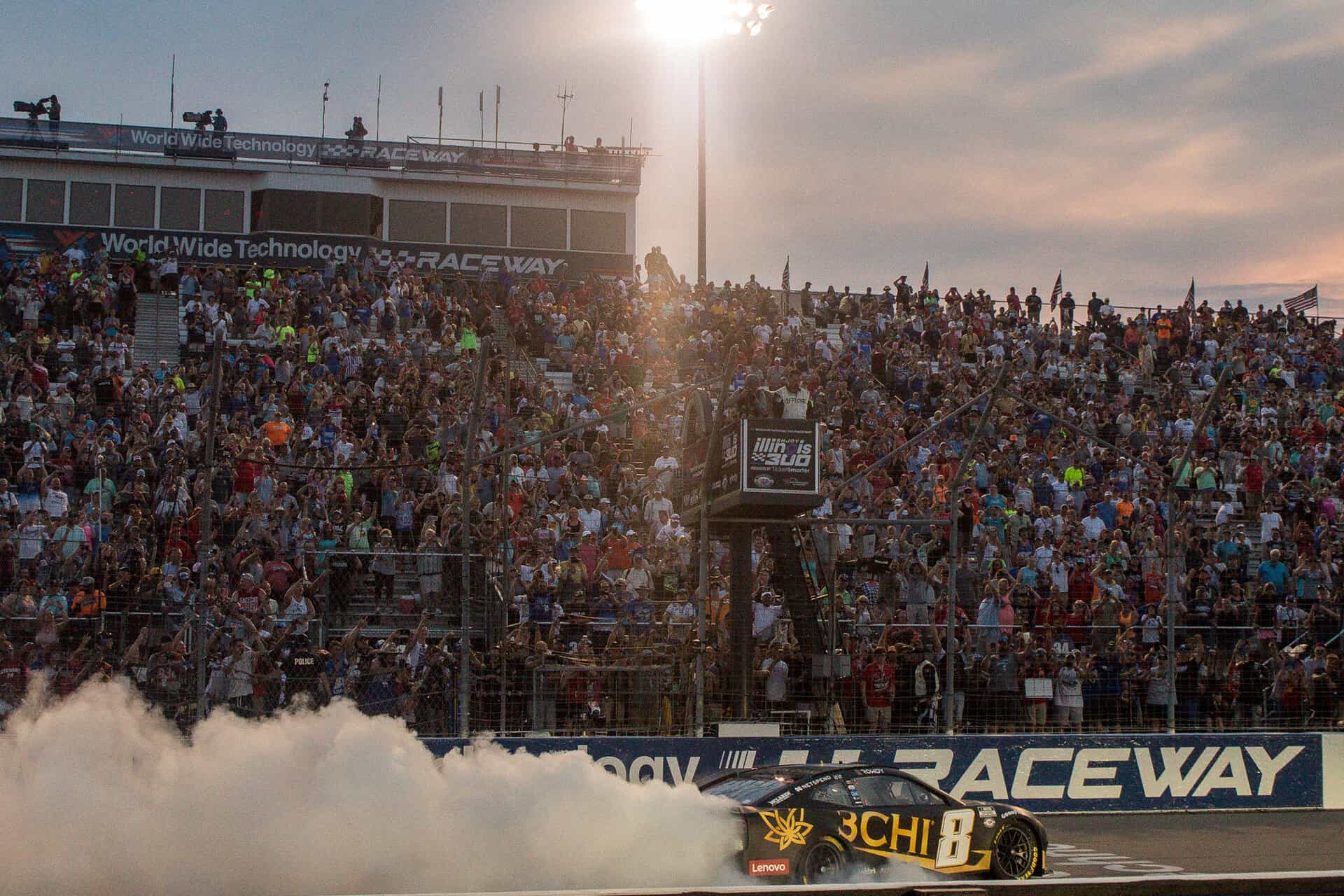 Kyle Busch gives the crowd a burnout after winning the Enjoy Illinois 300 at World Wide Technology Raceway.