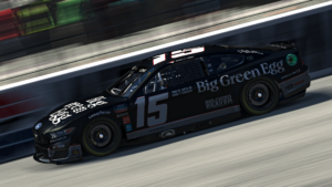 Garrett lowe launched a successful protest paint scheme into victory lane in the enascar coca-cola iracing series at new hampshire motor speedway.