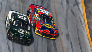 Jimmy mullis wrecked garrett lowe to take the enascar coca-cola iracing series win at nashville superspeedway in controversial fashion.