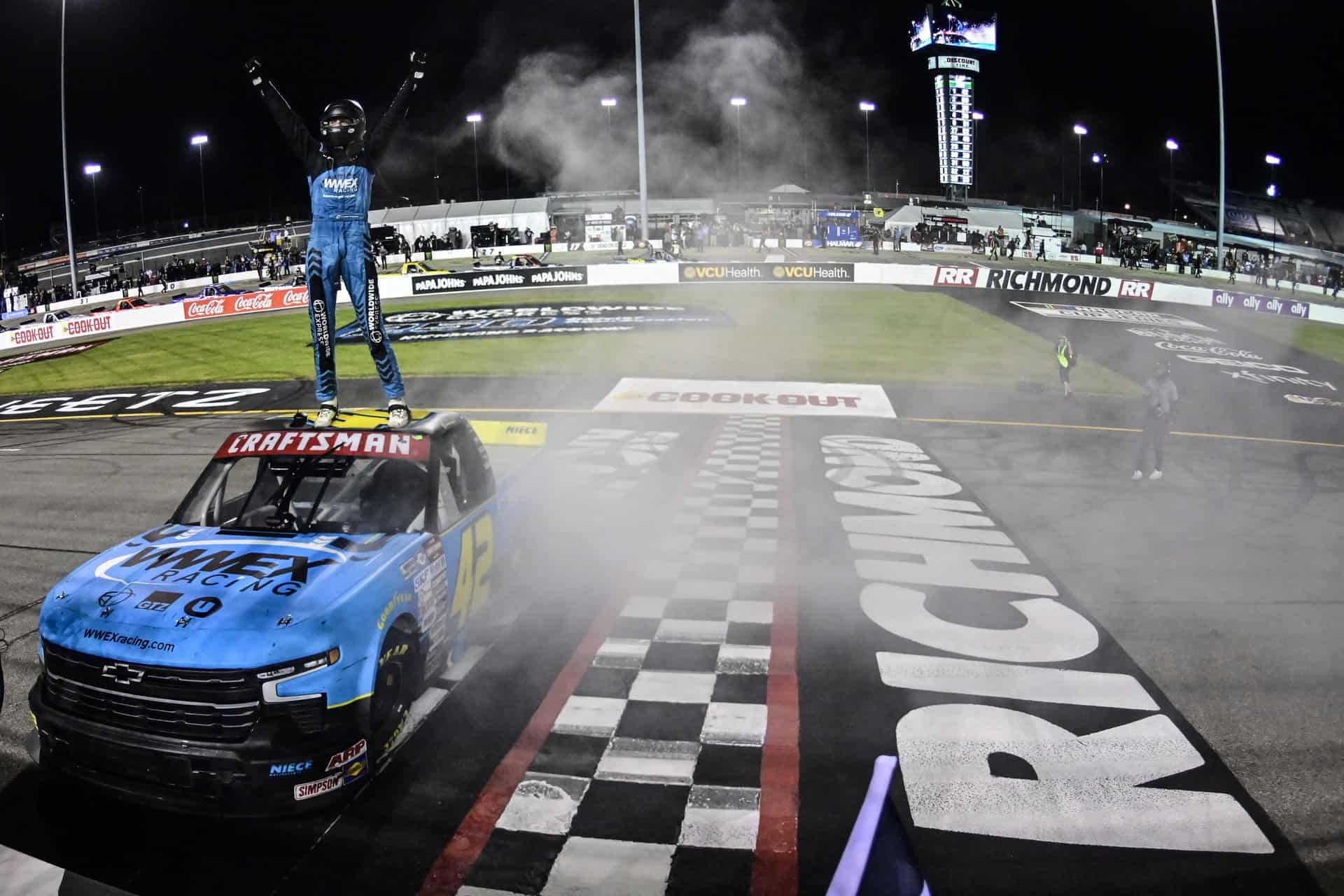 Carson hocevar took over the flag stand at richmond raceway to celebrate his nascar craftsman truck series victory with the fans.