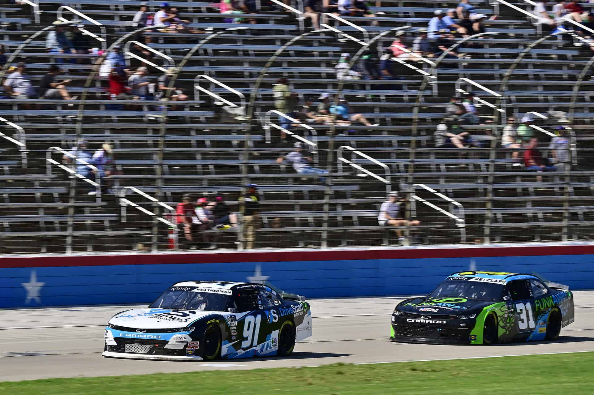 Landon milz's dream came true as kyle weatherman drove a drivesmart car he designed in the nascar xfinity series race at texas motor speedway.