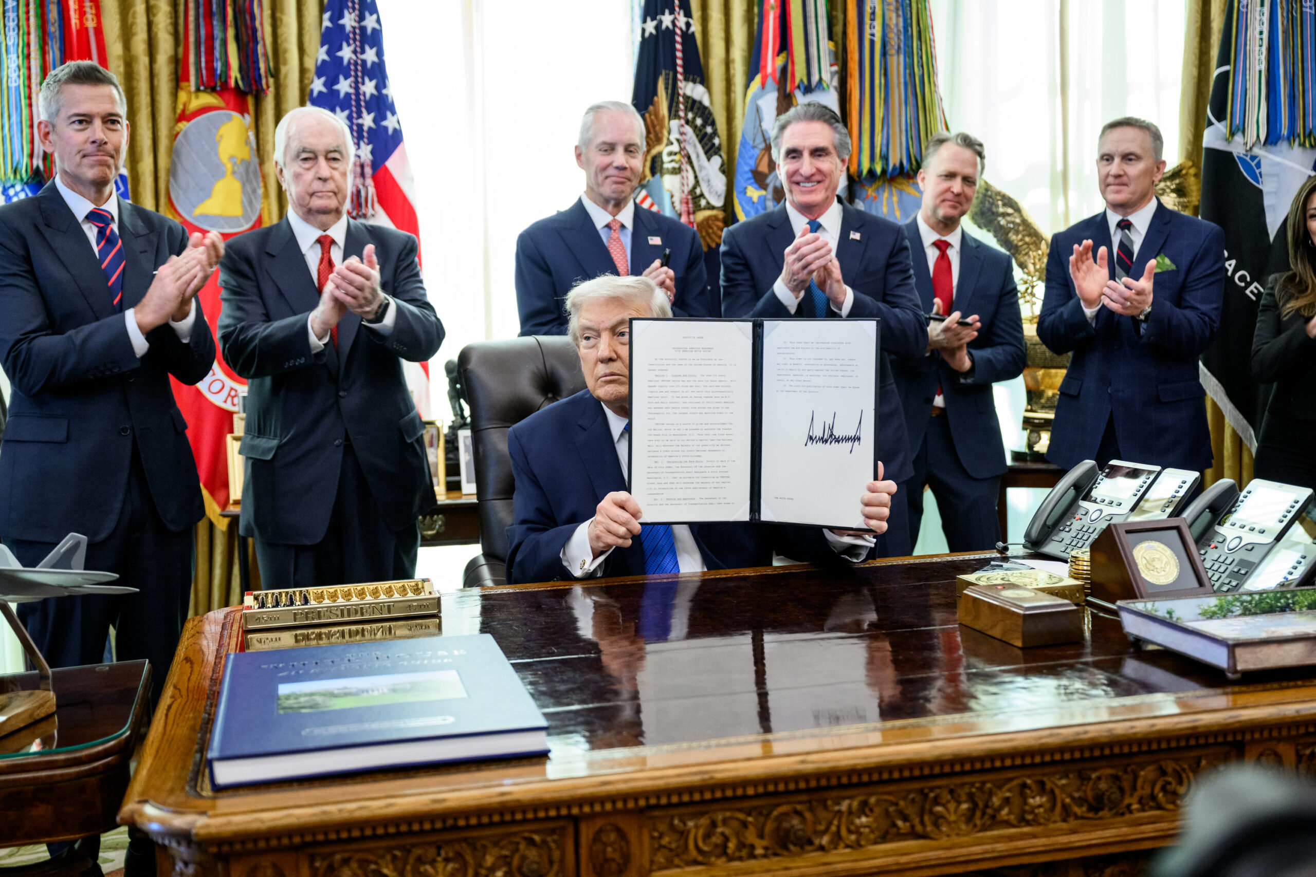 President Donald Trump signs executive order authorizing the Freedom 250 IndyCar race through the streets of Washington D.C. Photo courtesy White House X Account