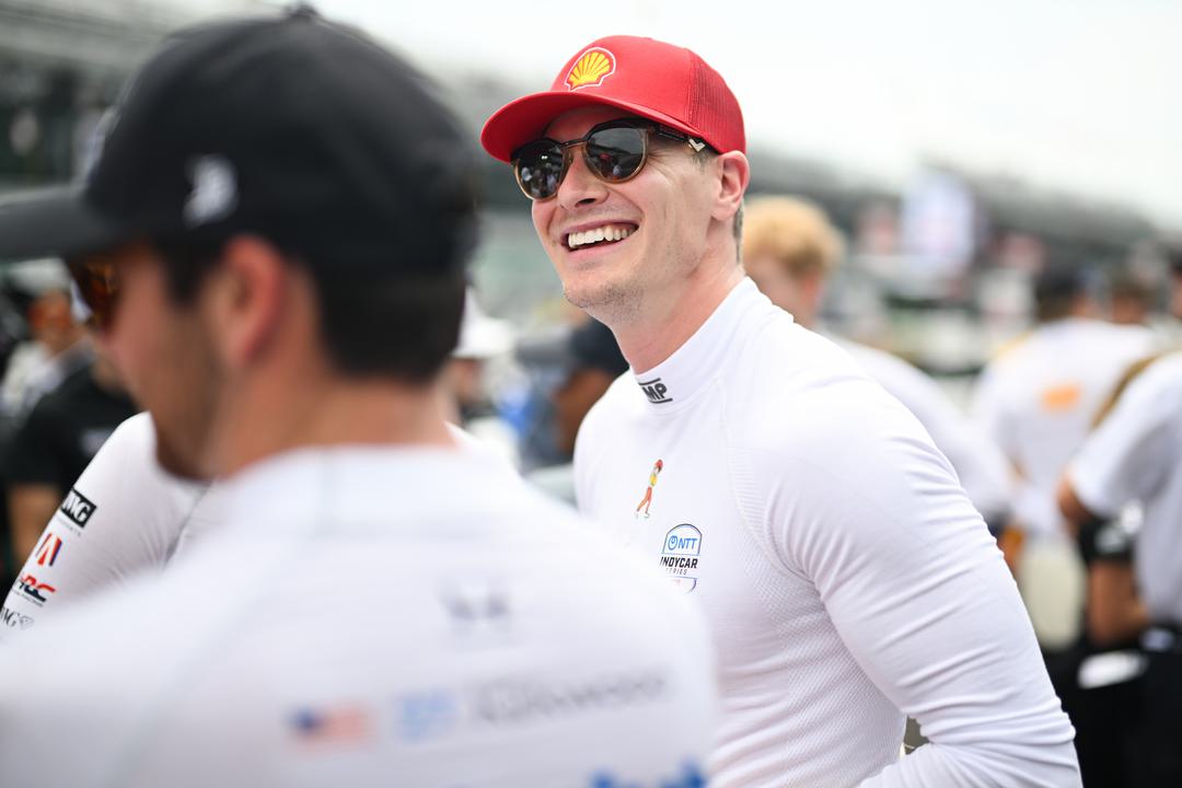 Josef Newgarden all smiles as his No. 2 Penske Chevrolet tops the Indy 500 practice charts.